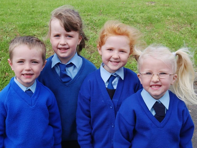 P 1 pupils at Gortnaghey Primary School. From left are Brandon McAleese, Jane McCloskey, Aisling Rose Daly and Rhiannon Farren. (2609C43):20 years on: Young people across Derry and Donegal starting school in September 2003