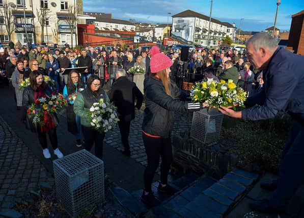 Relatives lay wreaths during the Annual Bloody Sunday Remembrance Service held at the monument in Rossville Street on Sunday morning. Photo: George Sweeney. DER2306GS – 17