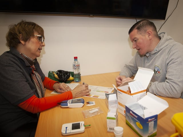 Colly Kelly taking part in a health check with OLT’s Sinead Devine on Saturday.