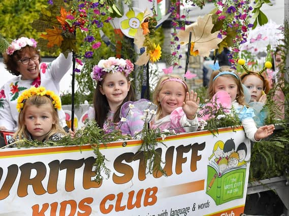 Muff Feile opening parade makes its way through the village on Friday evening. Photo: George Sweeney