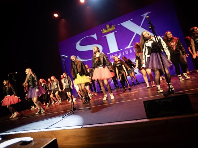 Senior pupils perform Six the musical at Friday's performance in the Millennium Forum.