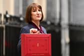 Chancellor of the Exchequer, Rachel Reeves, poses with the red Budget Box as she leaves 11 Downing Street to present the government's annual budget to Parliament on October 30, 2024 in London, England. This is the first Budget presented by the new Labour government and Chancellor of the Exchequer, Rachel Reeves. (Photo by Leon Neal/Getty Images)