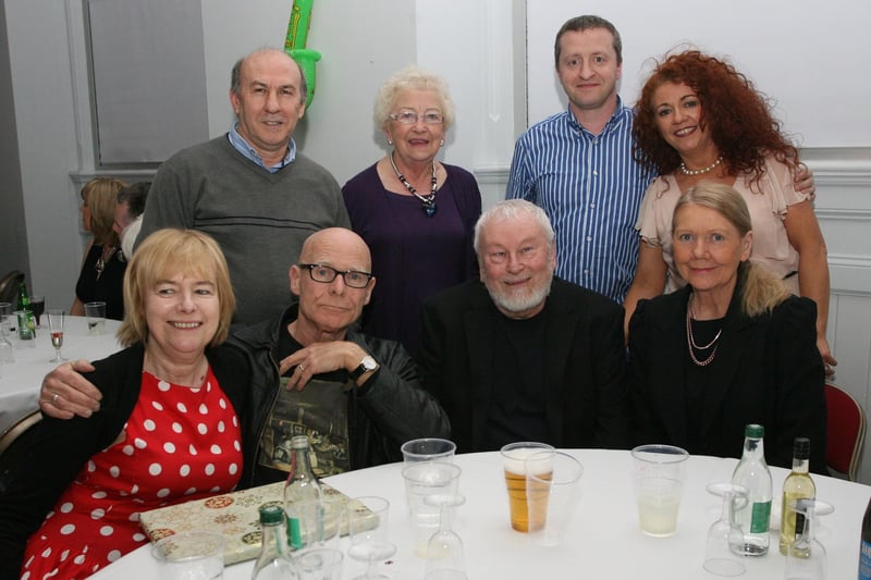 Dermie, seated, second from right, at at a birthday bash for Gay McIntyre in 2013, with, front from left, Goretti Horgan, Eamonn McCann and Pauline McClenaghan. Back from left, Kazim Demirarslan, Phoebe Barber and Linda and Ciaran Nicell. 0105JM04