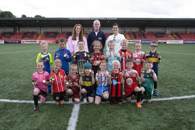 Club players of the tournament in the Ryan McBride Soccer Tournament played at the Brandywell on Wednesday as part of Feile 23. Included at back are Siounin McBride, Ryan's sister, his dad Lexie McBride, and Colleen McCay, Ryan's sister. (Photos: JIm McCafferty Photography)