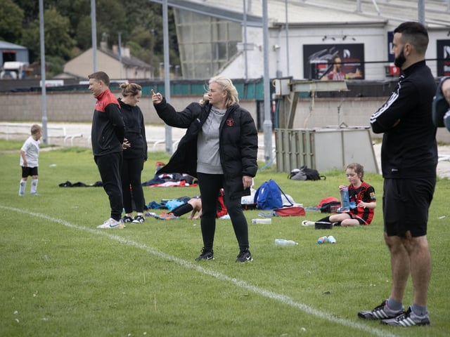 The Phoenix Athletic coach gets a message to her players.