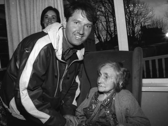 Daniel O'Donnell is greeted by a resident at Edenballymore.