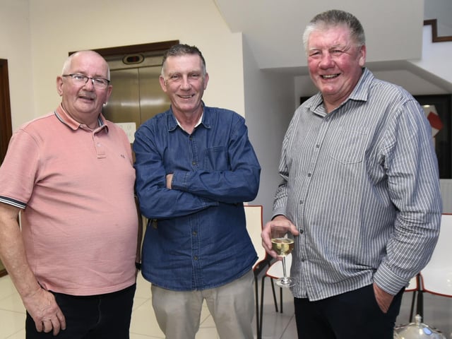 Colm McGuigan with Brian and Gerry McElhinney at Owenbeg on Friday night.