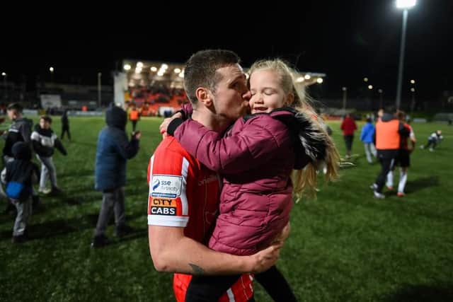 Patrick McEleney and his daughter Saorlaith on her birthday at Brandywell.