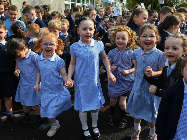 Children at Rosemount Primary School dance to the music and song of the Jive Aces on Thursday morning. Photo: George Sweeney