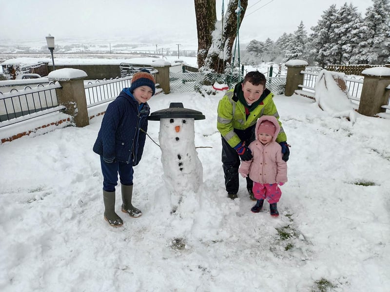 Conor, Shane and Erin with a brilliant snowman in Inishowen.