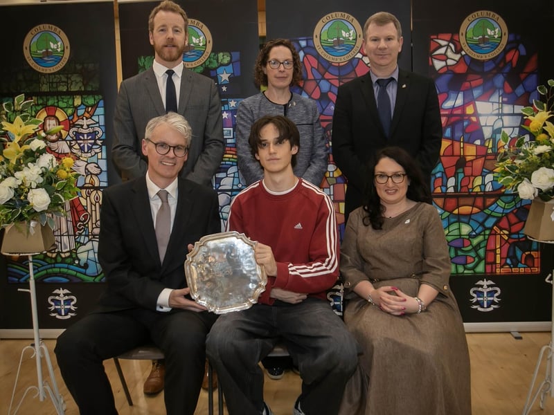 Mr Brendan McGurk, KC (Guest Speaker and Past Pupil), presenting the Monsignor Coulter Award for Mathematics and Science to Cathal McNicholl on Thursday. On right is Mrs Caroline McLaughlin (Principal). At Back are Mr Gavin Millar (Head of Chemistry), Mrs Ursula Grimley (VP) and Mr. Vincent Doherty (Head of Physics) : .
