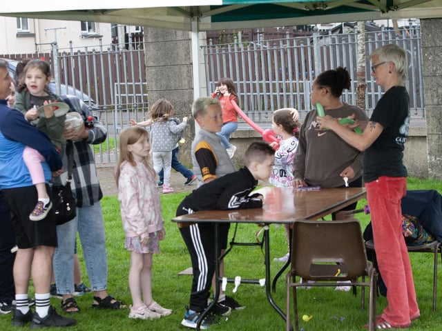 Sha Gillespie on balloon duty at the Creggan Féile event on Monday night.