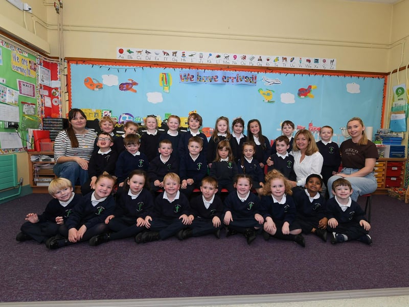 Mrs Kivlehan, second from right, pictured with her P1 class and classroom assistants at Good Shepherd Primary School.