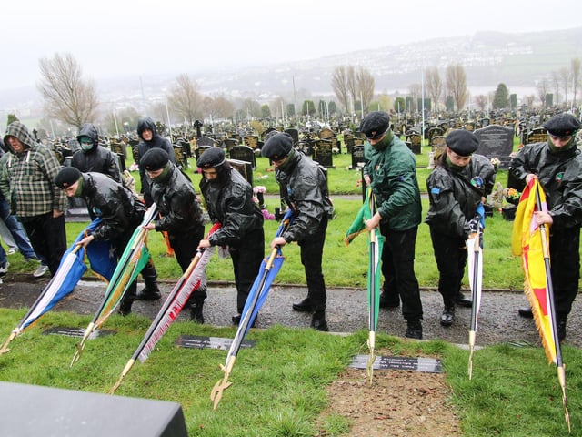 Members of the Colour Party salute at the IRSP Easter wreath laying commemoration at the Republican Socialist plot, City Cemetery. (Photo - Deirdre Heaney, nwpresspics)
