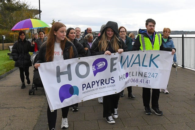 People taking part in the Foyle Hopewalk for PAPYRUS (Prevention of Young Suicide) charity, along the Foyle Embankment, on Tuesday evening last. Photo: George Sweeney