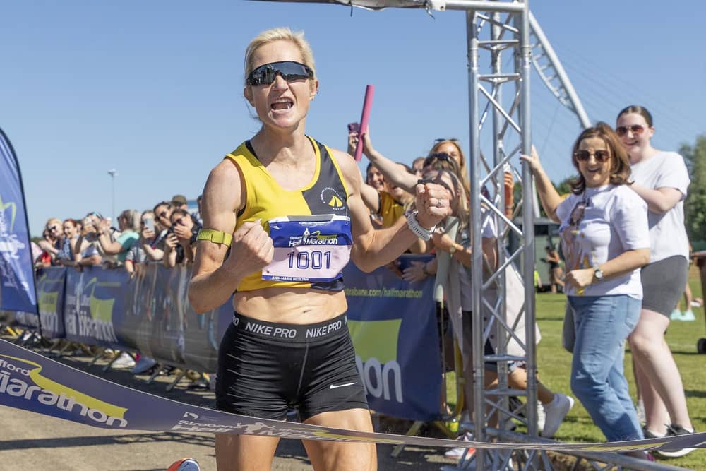 Strabane’s Ann Marie McGlynn is delighted as she claims the senior ladies title at the 2025 Strabane Lifford Half Marathon. (Photo: North West Newspix)