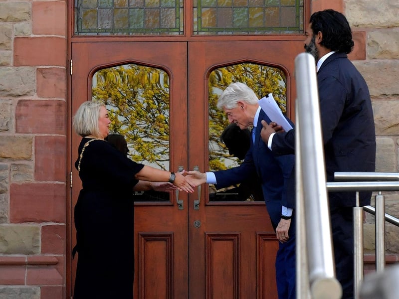 Bill Clinton is greeted by the Mayor, Sandra Duffy.
