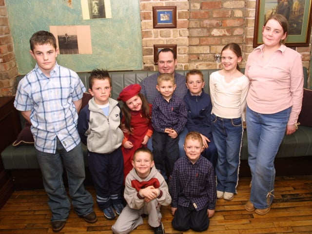 Eamonn pictured with some younger members of the family. (2503JM07):.