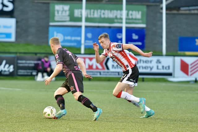 Derry City winger Daniel Kelly closes down Dundalk's Daryl Horgan at Brandywell on Friday night.