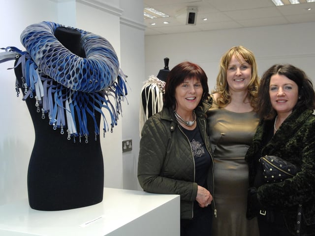 Artist Bernie Murphy with neighbours Caroline McLaughlin, left, and Catherine O'Connor attending the opening of her exhibition 'Threads of Life' at Eden Place Arts Centre. (DER1014PG056)