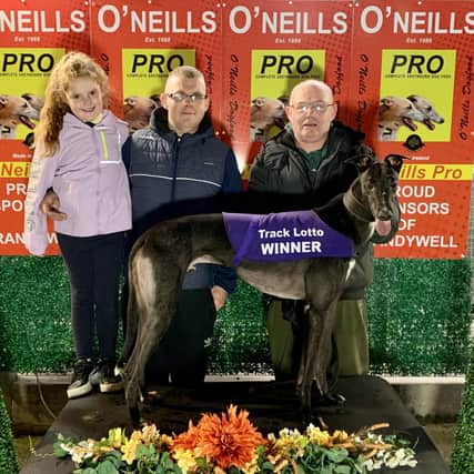 'Derrinasafa Jet' who won the last race at Brandywell Stadium on Monday in 17.00 with Orla Wray, her father, Kealan O’Kane, and his grandfather, Kevin.