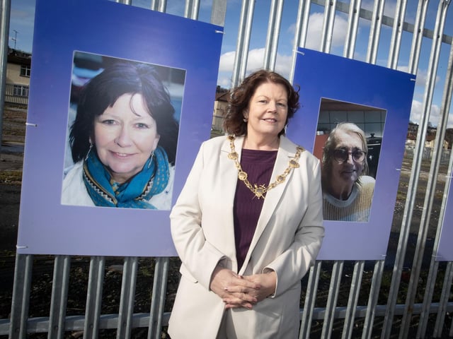 The Mayor, Patricia Logue at the launch of the exhibition on Monday. She is pictured beside portraits of the late Roisin Barton and Kitty Rowe.