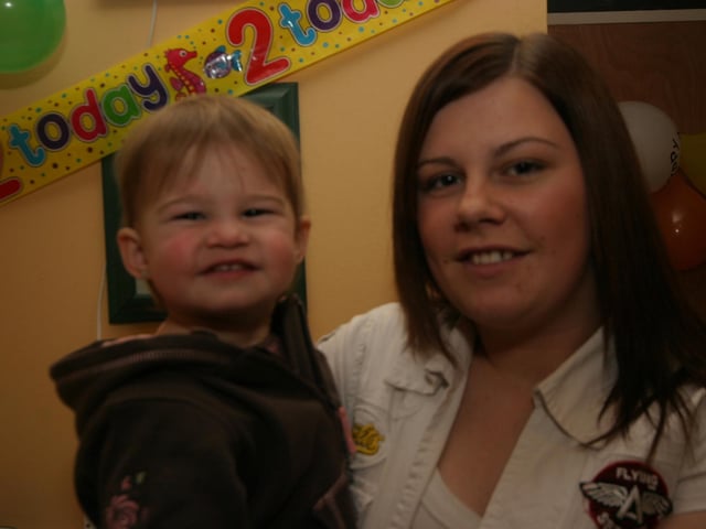 Leah smiles for the camera with her mum Kelly on the occasion of her 2nd birthday 0010/JML : Parties and celebrations January 2006: Leah McCallion.