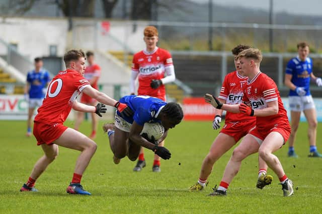 Cavan's Joshua Shehu attempts to dive past Derry trio Eamon Young, Gabhan McIvor and Caoimhin Hargan . Photo: George Sweeney