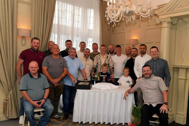 International footballer James McClean pictured with his son James, dad Patrick, his brother Patrick and friends at a celebration for his 100th cap for Ireland held in Bishops Gate Hotel on Tuesday evening.  Photo: George Sweeney. DER2325GS – 034