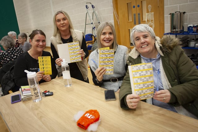 Eyes down for a full house at the Old Library Trust and Community Neighbourhood Partnership Community Bingo at the Bishop’s Field Centre on Wednesday night last. From left, Molly Liddy, Nicola Liddy, Michelle Griffin and Breidge Coyle. (Photos: Jim McCafferty Photography)