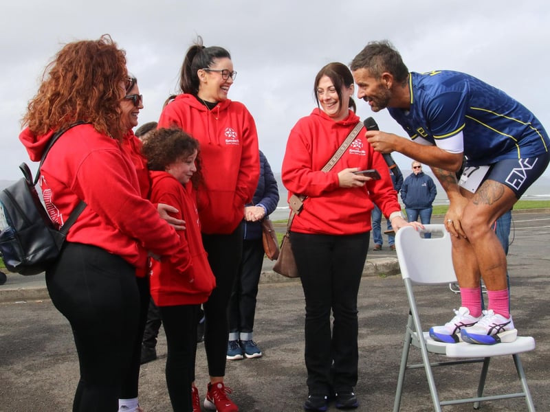 Mickey Doherty shares a moment with Rioghnach before the start of the walk. (Photo - Deirdre Heaney, nwpresspics) : Buncrana Pier Tragedy 10th Anniversary Remembrance Walk. Photos: Deirdre Heaney, nwpresspics.