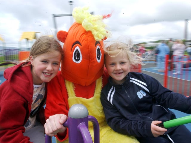 Hayley and Michaela McGowan, from Glendara, Derry, on the merry-go-round. (0607C65)