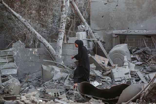 RAFAH, GAZA - JANUARY 25: Citizens inspect the effects of the destruction of the Omar bin Abdul Aziz Mosque, and the houses adjacent to it, due to Israeli air strikes on January 25, 2024 in Rafah, Egypt. The toll since the Oct. 7 war in Gaza between Israel and Hamas now exceeds 25,000 dead and 62,000 injured, according to the territory's health ministry. Two-thirds of the victims are believed to be women and children. The United Nations estimates for its part that more than 18,000 Palestinian children have lost a parent. With 25 per cent of the population, or more than half a million people, are in a situation of "food catastrophe" and threatened with famine. (Photo by Ahmad Hasaballah/Getty Images)