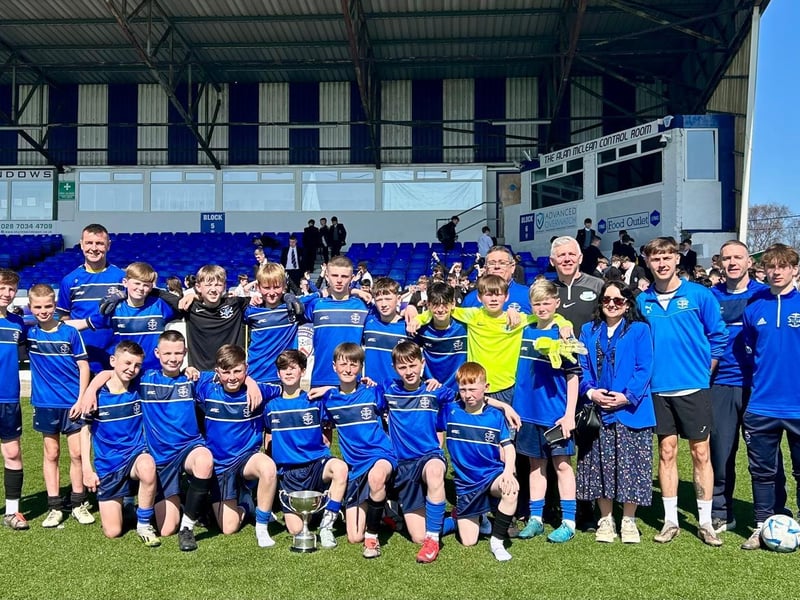 The victorious St Columb's College U12 team pictured with coaches.