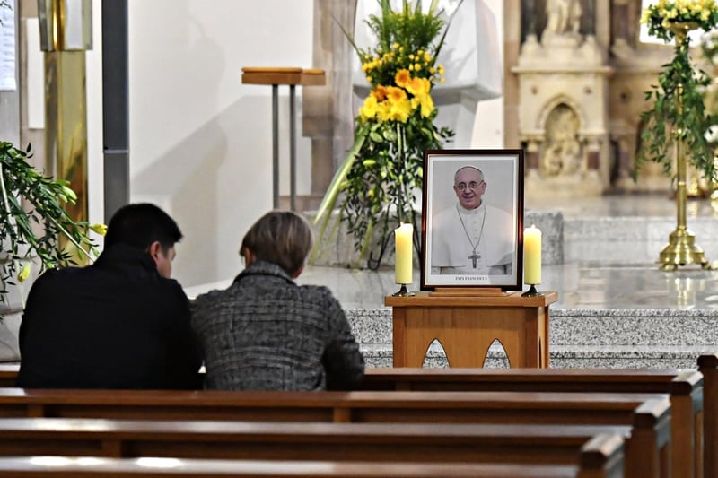 St Eugene’s Cathedral parishioners pray for Pope Francis who died early on Monday morning aged 88. Pope Francis (Jorge Mario Bergoglio) was discharged from hospital last month after five weeks of treatment for an infection that led to double pneumonia. He was first Latin American and the first Jesuit to be elected pontiff. Photo: George Sweeney