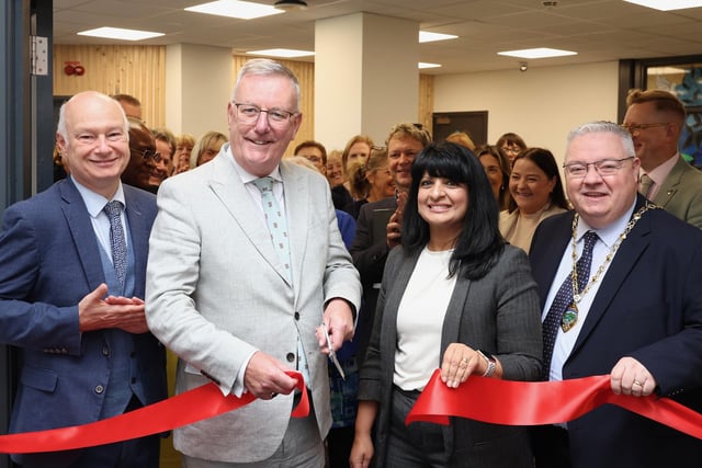 Paul Bartholomew, Vice Chancellor at Ulster University, Health Minister, Mike Nesbitt, Professor and Shahneela Grygiel, Assistant Director of Registration and Revalidation at the Nursing and Midwifery Council and Deputy Mayor of Derry City and Strabane District Council, Darren Guy cutting the ribbon at the Official Launch of the New Nursing Competence Test Centre located at Foyle House in Derry.