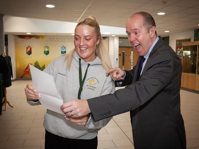 YOU DID IT!. . . .Vice Principal Mr. Joe Lafferty congratulates Jessica Bradley on her A Level results at St. Cecilia's College on Thursday morning. (Photos: Jim McCafferty Photography)