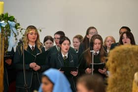 Students from St Cecilia’s College choir take part in a Carol Service held in St Mary’s Church, Creggan, on Tuesday afternoon. Photo: George Sweeney. DER2251GS – 01