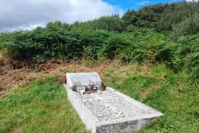 A plaque and shrine to the martyred friar.
