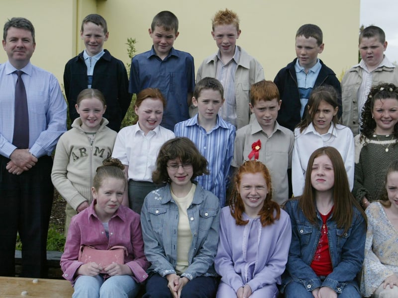 Glendermott PS pupils who received the sacrement of Confirmation from Bishop Langan at St. Mary's Church, Ardmore pictured here with their class teacher Mr. O'Kane.  (0905JB03)