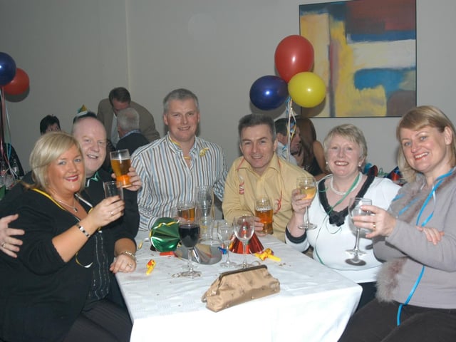 Ringing in the New Year at the New Year's Eve Party in the Tower Hotel on December 31 2004.