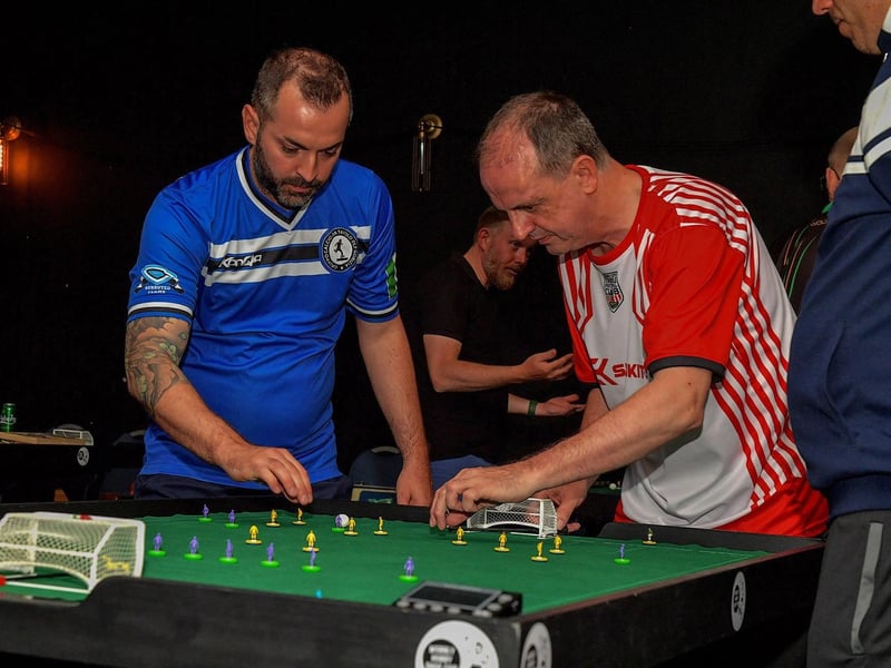 June 2023: Dee Jenkins, Derry City Table Football Club, in action against an Italian opponent during the Subbuteo Irish Open held in the Nerve Centre. Photo: George Sweeney