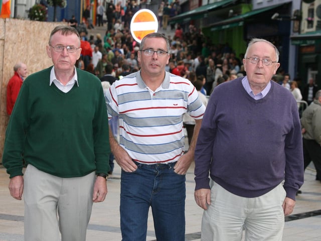 Donal O'Neill (centre) pictured with brothers, Eamon and John Gallagher on Sunday, enjoying the buzz about town. DER3313JM031
