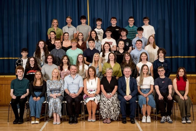 Excellence in A2 Results: Some of the 91 pupils who achieved 3 A grades or more in their A2 Examinations with Mrs Brónach O’Hare (Vice Principal), Mr Conor McKinney (Guest Speaker), Mrs Siobhan McCauley (Principal), Mrs Edel Moore (Chairperson, Board of Governors), Dr Michael Gormley (Senior Teacher).