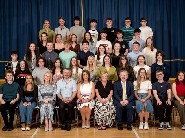 Excellence in A2 Results: Some of the 91 pupils who achieved 3 A grades or more in their A2 Examinations with Mrs Brónach O’Hare (Vice Principal), Mr Conor McKinney (Guest Speaker), Mrs Siobhan McCauley (Principal), Mrs Edel Moore (Chairperson, Board of Governors), Dr Michael Gormley (Senior Teacher).