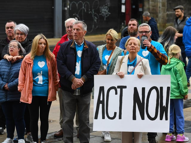 Some of the attendance, in Guildhall Square, at Caleb's Cause rally calling for legal protection for young people with Special Educational Needs who have disabilities in Northern Ireland beyond the age of 19. Photo: George Sweeney