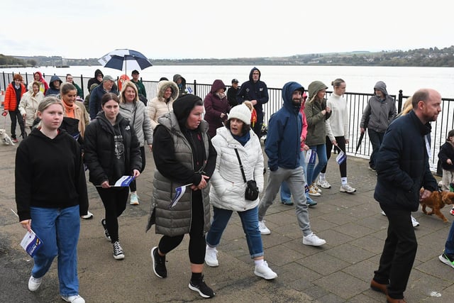 People taking part in the Foyle Hopewalk for PAPYRUS (Prevention of Young Suicide) charity, along the Foyle Embankment, on Tuesday evening last. Photo: George Sweeney