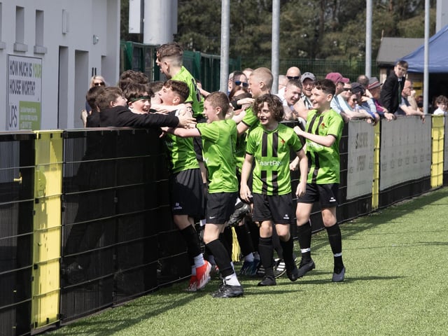 St. Joseph's players celebrate with their supporters at Thursday's u-12 Ni Schools Final. (Photo: Jim McCafferty)