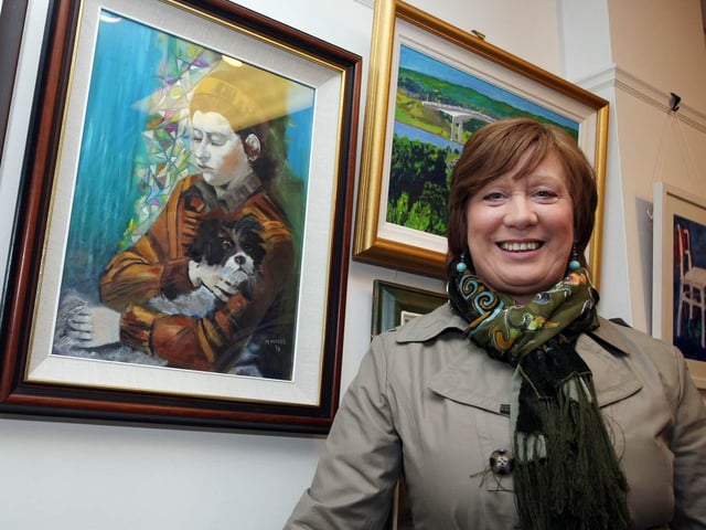 Marie Magee, enjoys the end of term exhibition, held in the Eden Arts Centre. 0604GM03EDEN