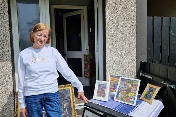 Monica Duffy who is selling jigsaws she made after getting sober in aid of the Foyle Hospice.